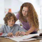 Siblings studying together